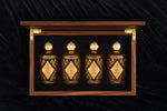 Natural brown wooden box containing Ameenah’s Oriental Collection perfumes , Musk, Amber, Oud, and Rose.
